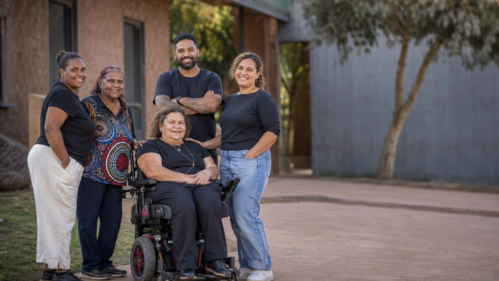 The Glory Care Services support team standing together outdoors in Alice Springs